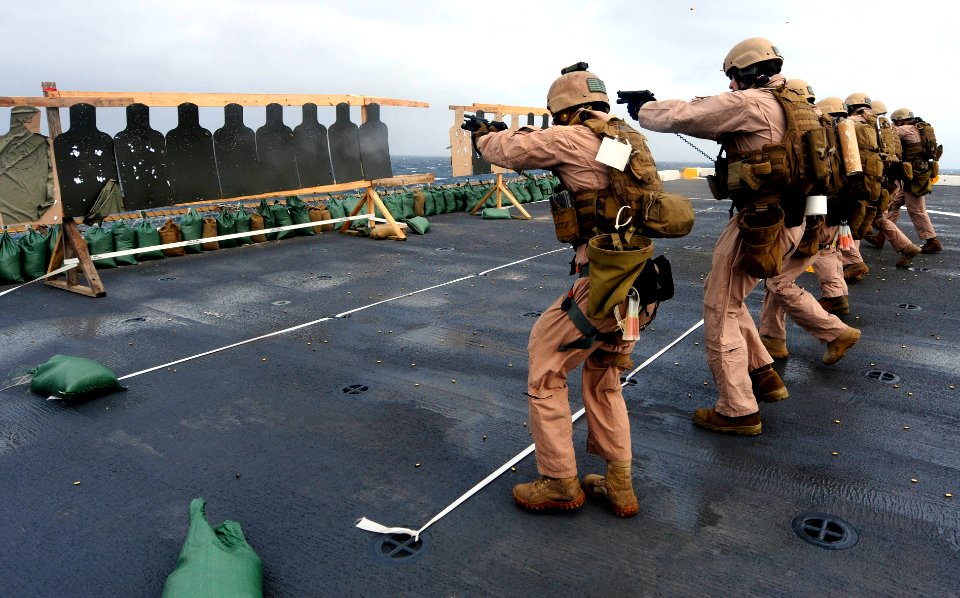 US Navy 110422-N-OS574-033 Marines perform small arms qualifications on the flight deck aboard USS Mesa Verde (LPD 19)