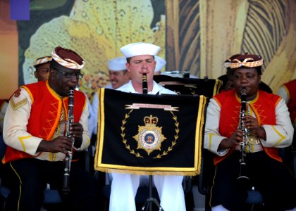 US Navy 110421-N-NY820-071 Musician 3rd Class Fred Vaughan, assigned to the U.S. Fleet Forces Band, and members of the Jamaican Defense Force Band