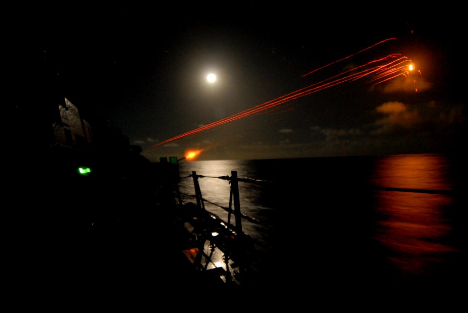 US Navy 110421-N-ZI300-155 The guided-missile destroyer USS Nitze (DDG 94) participates in a live-fire flare exercise
