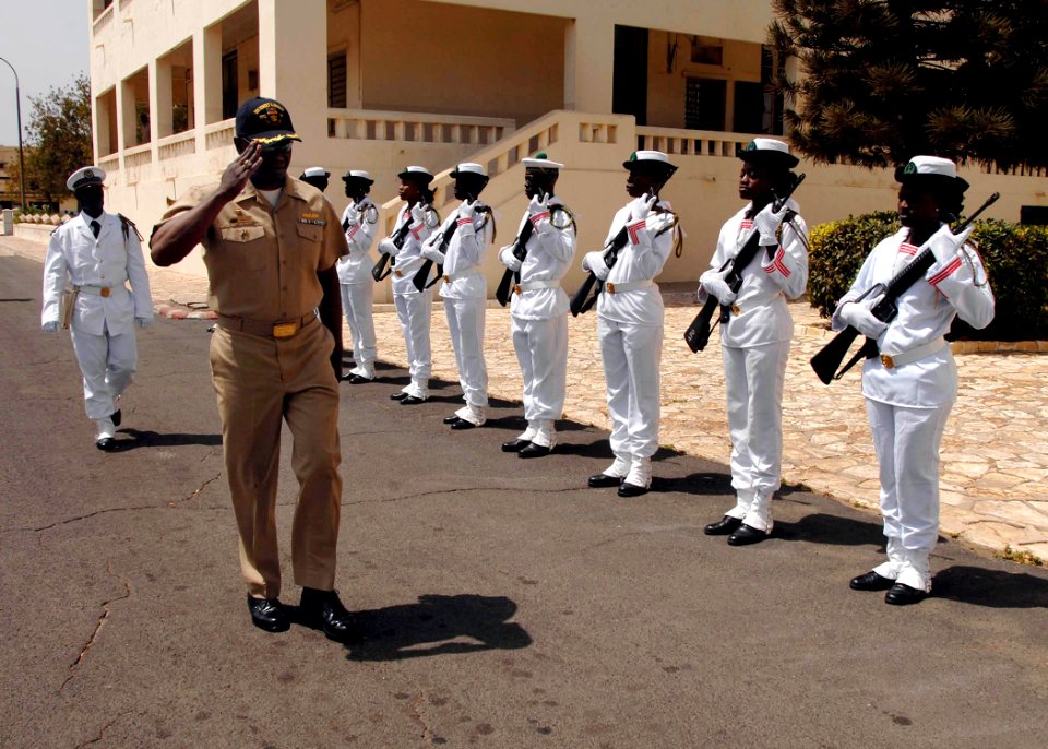 US Navy 110421-N-HI707-189 Cmdr. Darryl Brown, commanding officer of the guided-missile frigate USS Robert G. Bradley (FFG 49), salutes Senegalese