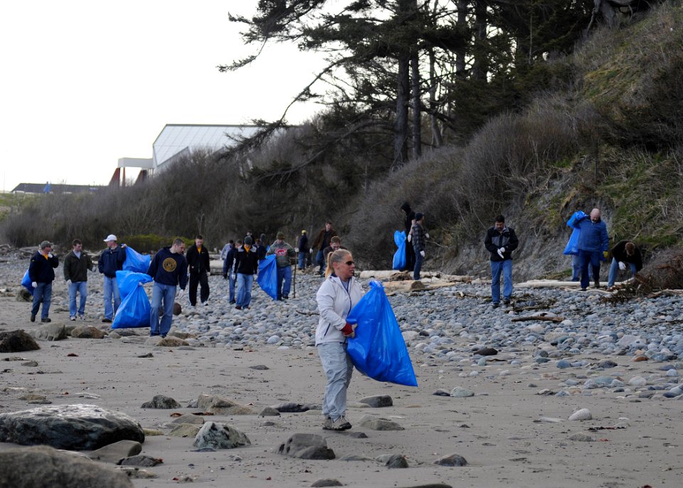 US Navy 110422-N-ZK021-003 Sailors from Naval Air Station Whidbey Island commands collect trash along the beach at Costen-Turner Memorial Park to c