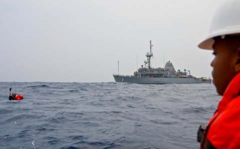 US Navy 110429-N-SP676-060 Mineman 3rd Class Joshua Sinsheimer, left, a search and rescue diver aboard the mine countermeasures ship USS Avenger (M
