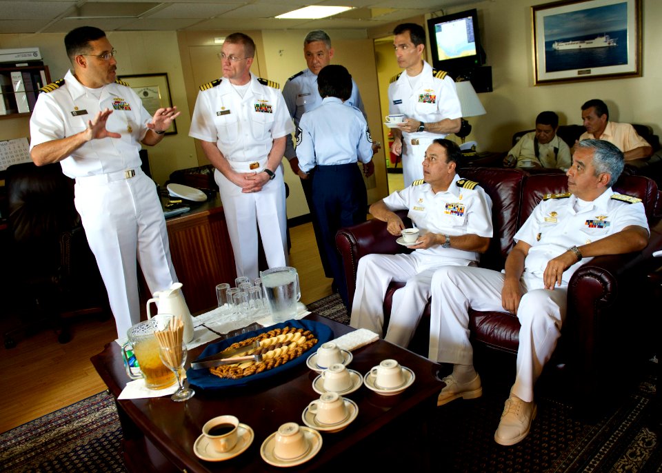 US Navy 110430-N-RM525-074 Commodore Brian Nickerson, left, mission commander for Continuing Promise 2011, talks with Peruvian navy Rear Adm. Ricar