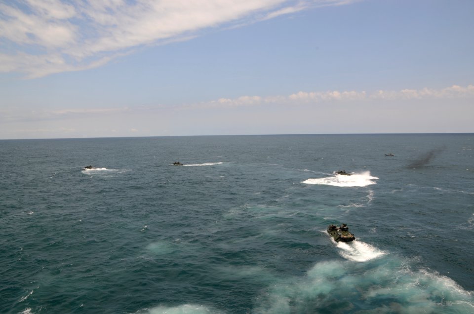 US Navy 110504-N-7680E-281 An amphibious assault vehicle departs the well deck of USS Iwo Jima (LHD 7)