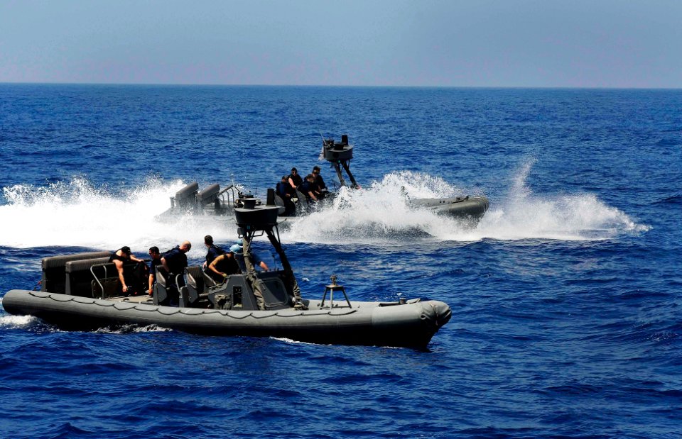 US Navy 110429-N-OS570-028 Sailors and Marines assigned to the amphibious transport dock ship USS Mesa Verde (LPD 19) conduct a visit, board, searc