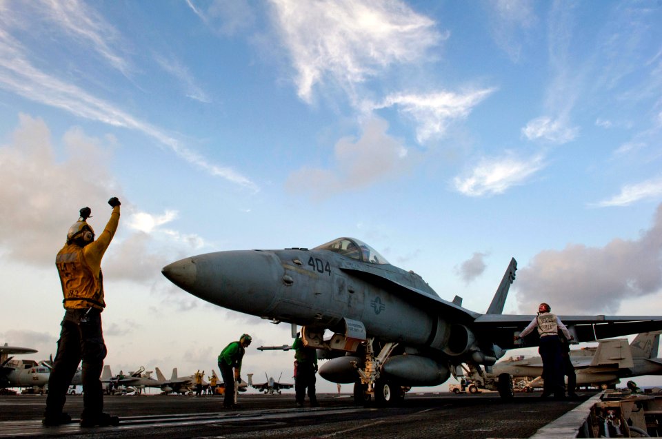 US Navy 110430-N-DR144-696 An F-A-18C Hornet assigned to Strike Fighter Squadron (VFA) 25 is positioned on catapult No. 4 aboard the Nimitz-class a