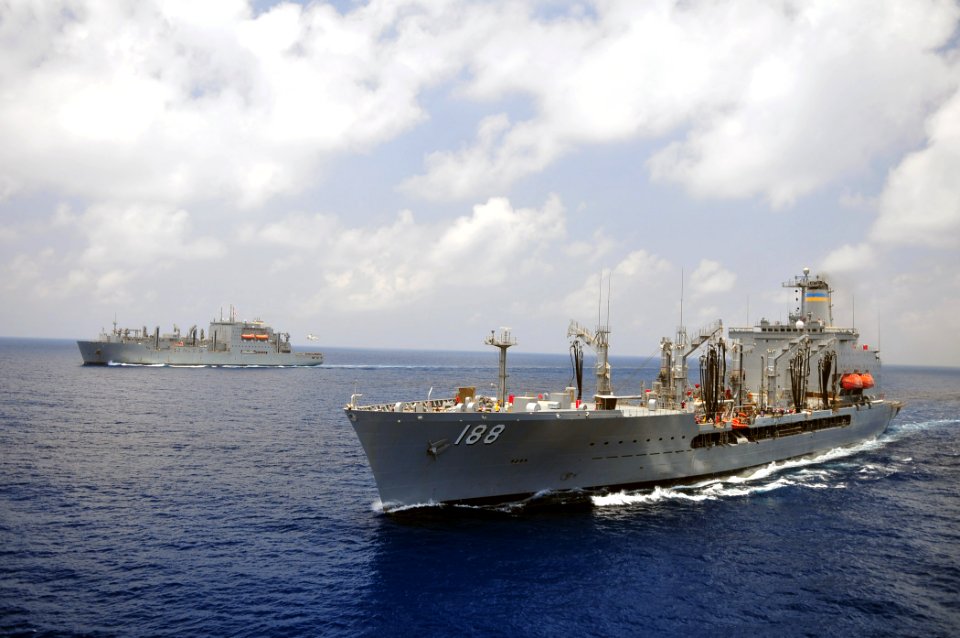 US Navy 110427-N-ZS026-095 The Military Sealift Command dry cargo and ammunition ship USNS Alan Shepard (T-AKE 3), left, and the fleet replenishmen