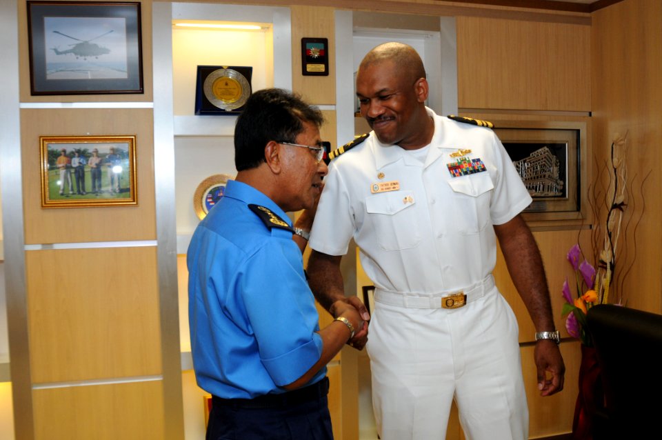 US Navy 110505-N-SP676-024 Lt. Cmdr. Patrick L. German meets with Rear Adm. Dato Anuwi bin Hassan, commander of Naval Region 2