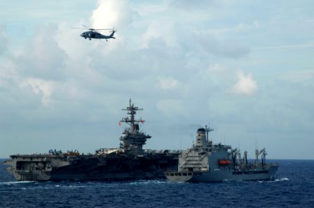 US Navy 110504-N-6006S-093 The Nimitz-class aircraft carrier USS Carl Vinson (CVN 70) receives fuel from the Military Sealift Command fleet repleni