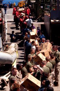 US Navy 110504-N-QP268-152 Sailors and Marines assigned to the 22nd Marine Expeditionary Unit (22nd MEU) participate in a working party during a ve