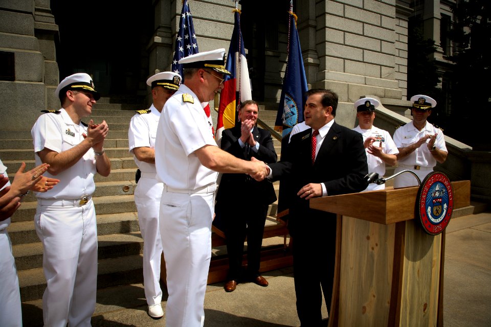 US Navy 110502-N-YM440-216 Vice Adm. Kevin M. McCoy greets Senate President Brandon Shaffer after a proclamation ceremony on the steps of the Color