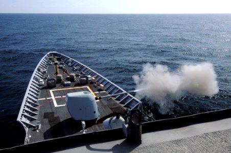 US Navy 110503-N-AE328-023 The guided-missile cruiser USS Lake Erie (CG 70) fires a 70-pound practice projectile from its 5-inch-54 caliber Mark 45