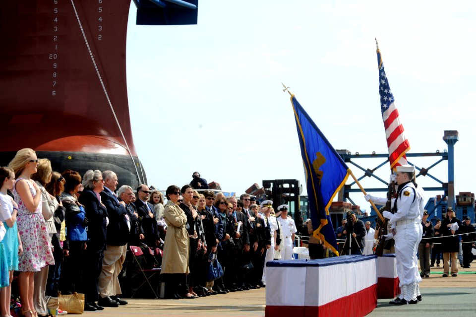 US Navy 110507-N-KK330-153 Guests render honors during the national anthem during the christening ceremony for the Arleigh Burke-class guided-missi