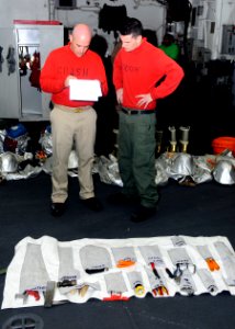 US Navy 110505-N-3154P-097 Chief Aviation Boatswain's Mate (Handling) David Meyer and Aviation Boatswain's Mate (Handling) Marcus Hayward inventory
