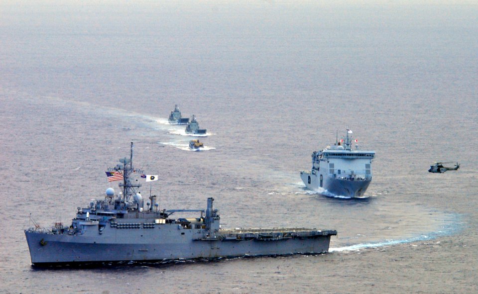 US Navy 110509-N-KB563-512 The amphibious transport dock ship USS Cleveland (LPD 7) leads a formation of ships