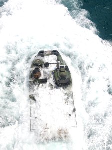 US Navy 110504-N-7680E-267 An amphibious assault vehicle departs the well deck of USS Iwo Jima (LHD 7)