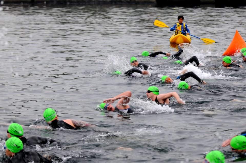 US Navy 110507-N-5891C-187 Sailors and other members of the Yokosuka community start the 400-meter swim portion of the 2011 Subway Triathlon Series