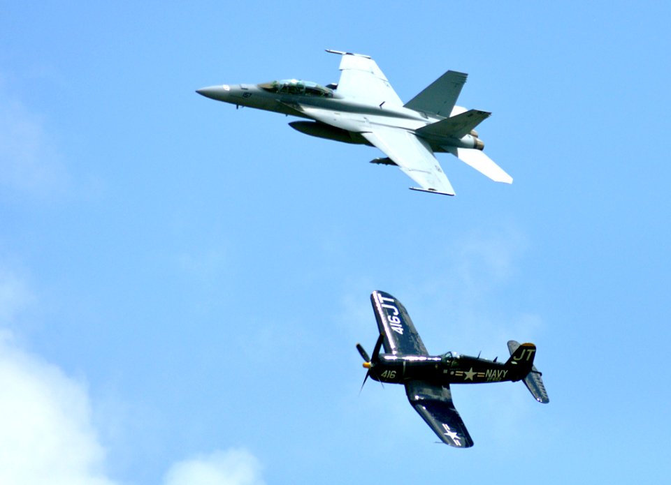 US Navy 110508-N-SD120-005 An F4U-4 Corsair aircraft flies alongside an F-A-18F Super Hornet during a Centennial of Naval Aviation trib
