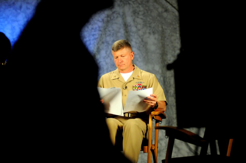 US Navy 110506-N-AD372-003 Master Chief Petty Officer of the Navy (MCPON) Rick D. West reviews his notes before recording a podcast at the Defense