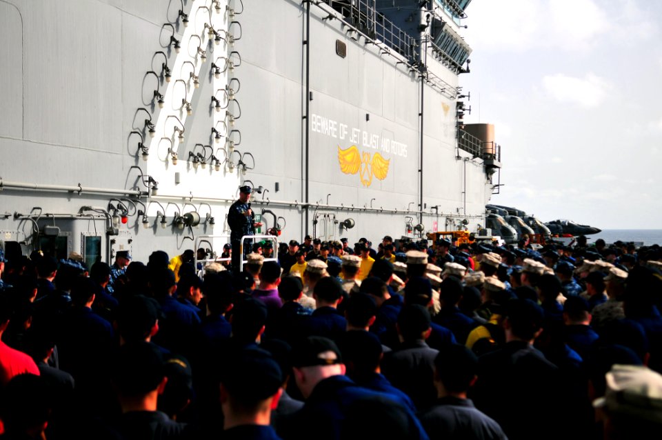 US Navy 110506-N-ZS026-202 Capt. Frank Michael addresses the crew and embarked personnel during an all-hands call aboard USS Boxer (LHD 4)