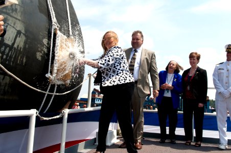 US Navy 110507-N-KK330-558 Maureen Murphy, mother of Lt. Michael Murphy (SEAL) and ship's sponsor, breaks a bottle of champagne across the bow of t