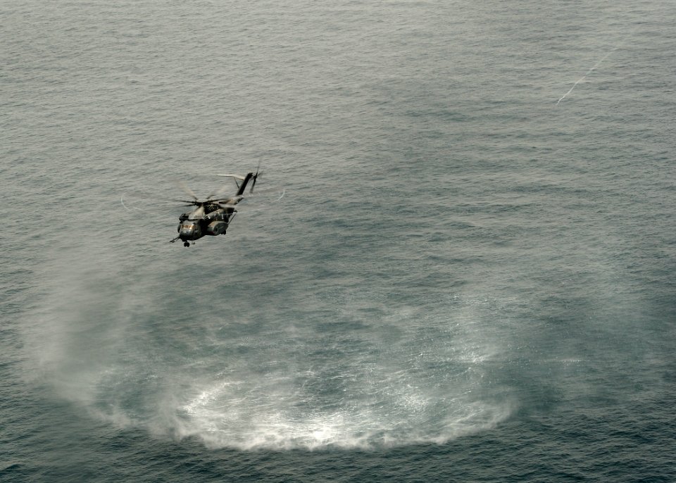 US Navy 110509-N-TY225-156 A CH-53 Sea Stallion helicopter assigned to Helicopter Mine Countermeasures Squadron (HM) 15 conducts an airborne mine c
