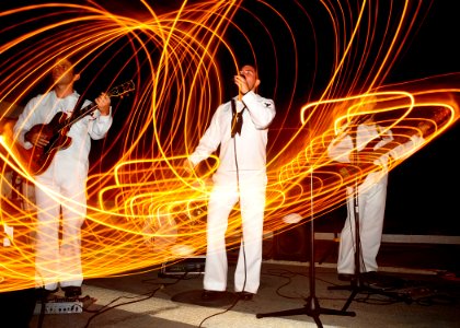 US Navy 110508-N-BC134-082 The Pacific Partnership 2011 band performs during a reception aboard USS Cleveland (LPD 7)