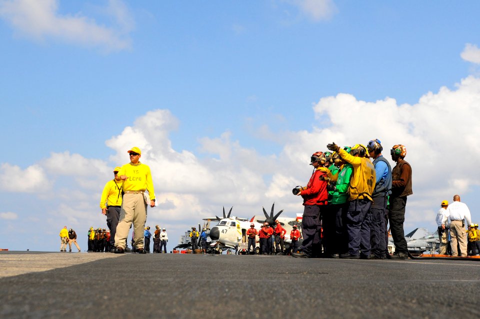 US Navy 110511-N-OK922-594 Sailors simulate fighting an aircraft fire during a mass casualty drill on the flight deck of USS Carl Vinson (CVN 70)