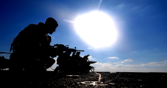 US Navy 110510-N-OS574-162 Marines participate in a small arms qualification on the flight deck aboard USS Mesa Verde (LPD 19)