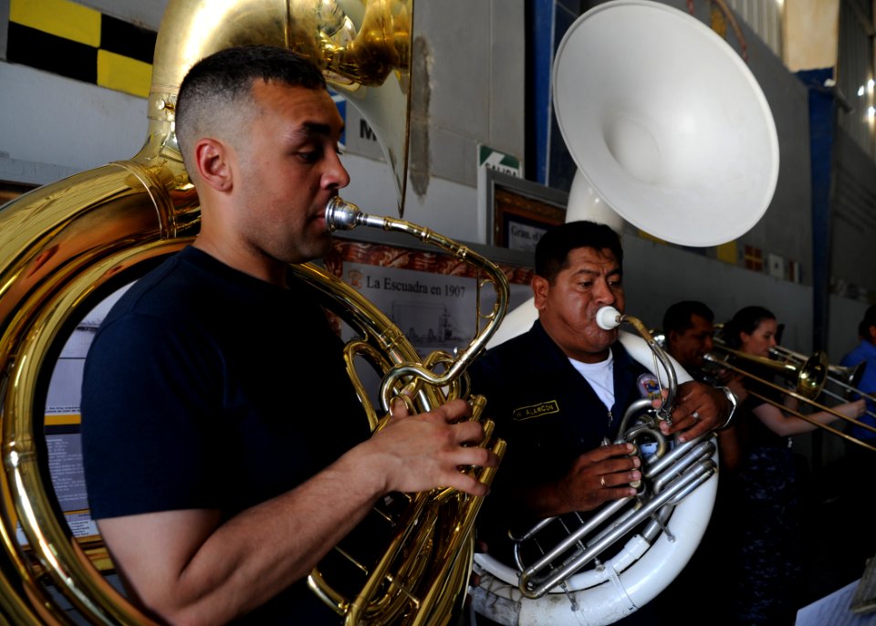 US Navy 110506-N-NY820-325 Musician 3rd Class Chris Roland, assigned to the U.S. Fleet Forces Band, practices with members of the Peruvian navy ban
