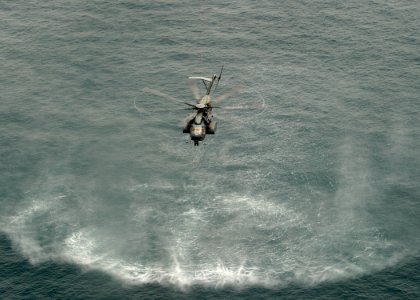 US Navy 110509-N-TY225-157 A CH-53 Sea Stallion helicopter assigned to Helicopter Mine Countermeasures Squadron (HM) 15 conducts an airborne mine c