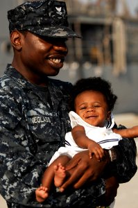 US Navy 110510-N-DU438-083 Operations Specialist 2nd Class Justin B. Wineglass, assigned to the guided-missile cruiser USS Gettysburg (CG 64), hold