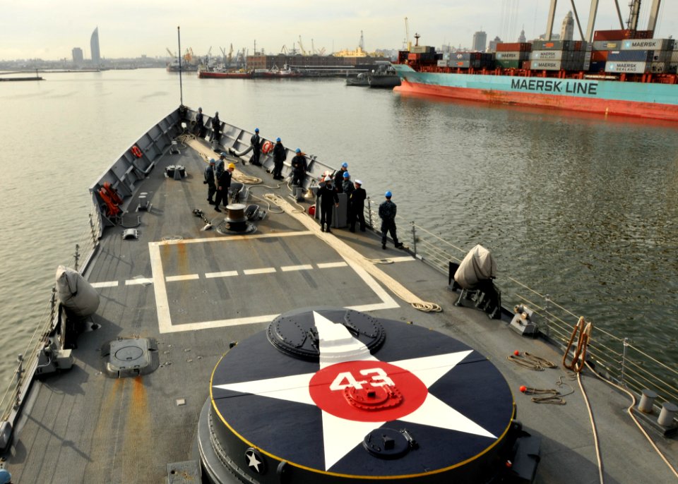US Navy 110513-N-NL541-111 Sailors assigned to the deck department of the guided-missile frigate USS Thach (FFG 43) stand by as Thach enters the ha