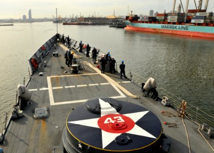 US Navy 110513-N-NL541-111 Sailors assigned to the deck department of the guided-missile frigate USS Thach (FFG 43) stand by as Thach enters the ha