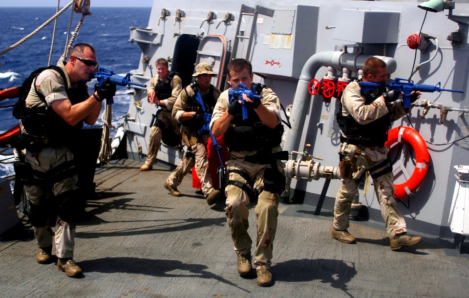 US Navy 110511-N-MM360-112 Members of the visit, board, search, and seizure team aboard the guided-missile destroyer USS Mason (DDG 87) practice ta