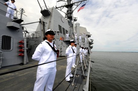 US Navy 110511-N-TB177-384 Sailors assigned to the guided-missile cruiser USS Gettysburg (CG 64) man the rails on the ship's fantail while departin