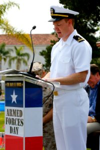 US Navy 110514-N-HW977-380 Reserve component chaplain Lt. j.g. B. Shane Anderson delivers the invocation during an Armed Forces Day celebration at