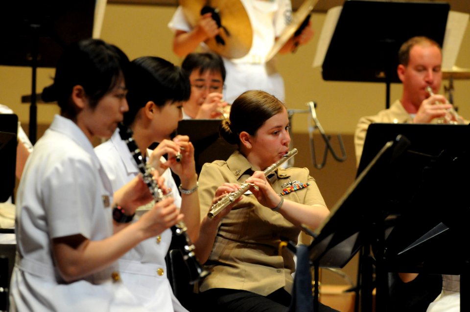 US Navy 110514-N-MU720-023 Musician 3rd Class Danielle Clark plays the clarinet with members of the Japan Maritime Self-Defense Force Band during a