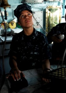 US Navy 110510-N-DU438-317 Quartermaster Seaman Barbara Flores, assigned to the guided-missile cruiser USS Gettysburg (CG 64), stands watch on the