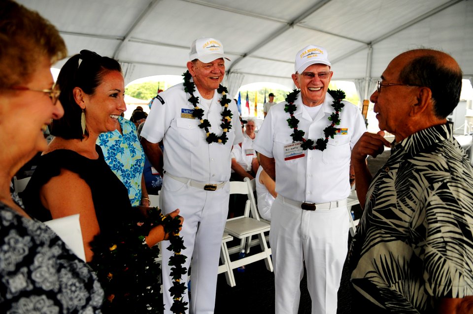 US Navy 110510-N-WP746-030 Retired Vice Adm. Robert K. U. Kihune, right, chairman of the USS Missouri Memorial Association Inc., speaks to former c