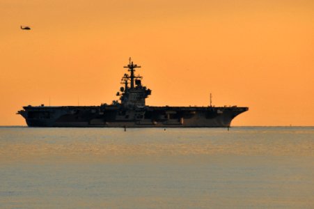 US Navy 110511-N-PS473-079 The Nimitz-class aircraft carrier USS George H.W. Bush (CVN 77) departs Naval Station Norfolk on its maiden deployment