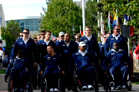 US Navy 110516-N-CD297-025 Team Navy-Coast Guard march the walkway to begin opening ceremonies of the second annual Warrior Games at the Olympic Tr