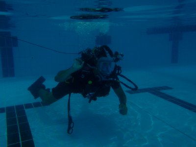 US Navy 110511-N-YX920-065 A British sailor conducts line tending training during a shared pool dive with Commander, Task Group (CTG) 56.1