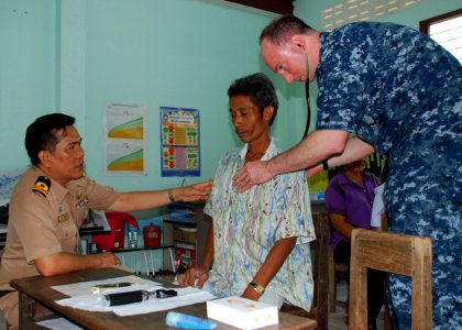 US Navy 110512-N-VP123-053 Lt. Cmdr. Mike Termini, right, a physician assigned to Naval Hospital Yokosuka, Japan, and a Royal Thai Navy physician e