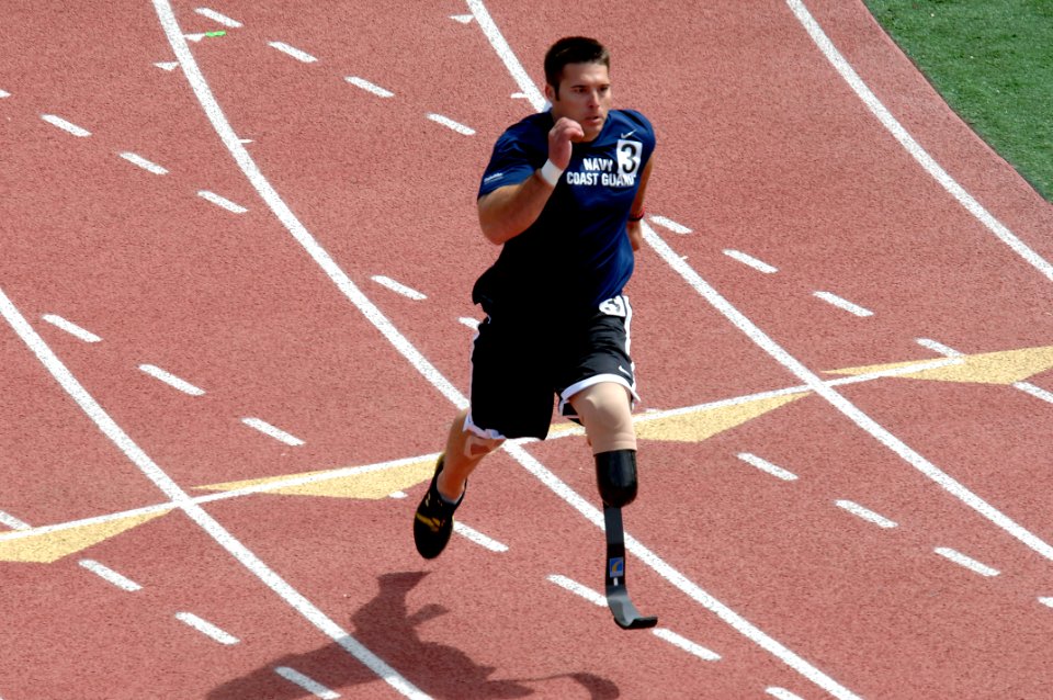 US Navy 110517-N-CD297-051 Explosive Ordnance Disposal 1st Class Patrick Woodruff from Team Navy-Coast Guard runs the 200-meters at the Olympic Tra