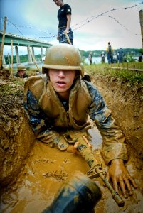 US Navy 110517-N-OA833-003 A U.S. Naval Academy plebe navigates the low crawl obstacle during Sea Trials, the capstone training exercise for Naval photo