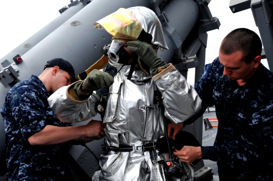 US Navy 110517-N-WW409-418 Sailors aboard SS Fitzgerald (DDG 62) demonstrate a helicopter crash and salvage drill during a day embark with local ci