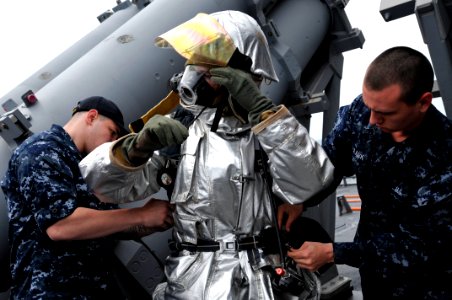 US Navy 110517-N-WW409-418 Sailors aboard SS Fitzgerald (DDG 62) demonstrate a helicopter crash and salvage drill during a day embark with local ci