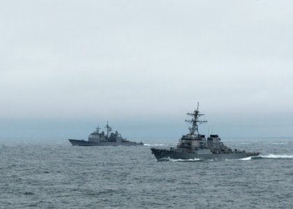 US Navy 110515-N-YM590-059 The guided-missile destroyer USS Mitscher (DDG 57), foreground, and the guided-missile cruiser USS Gettysburg (CG 64) ar