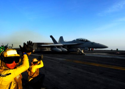 US Navy 110518-N-SB672-325 Sailors signal to suspend a launch aboard the aircraft carrier USS Ronald Reagan (CVN 76)